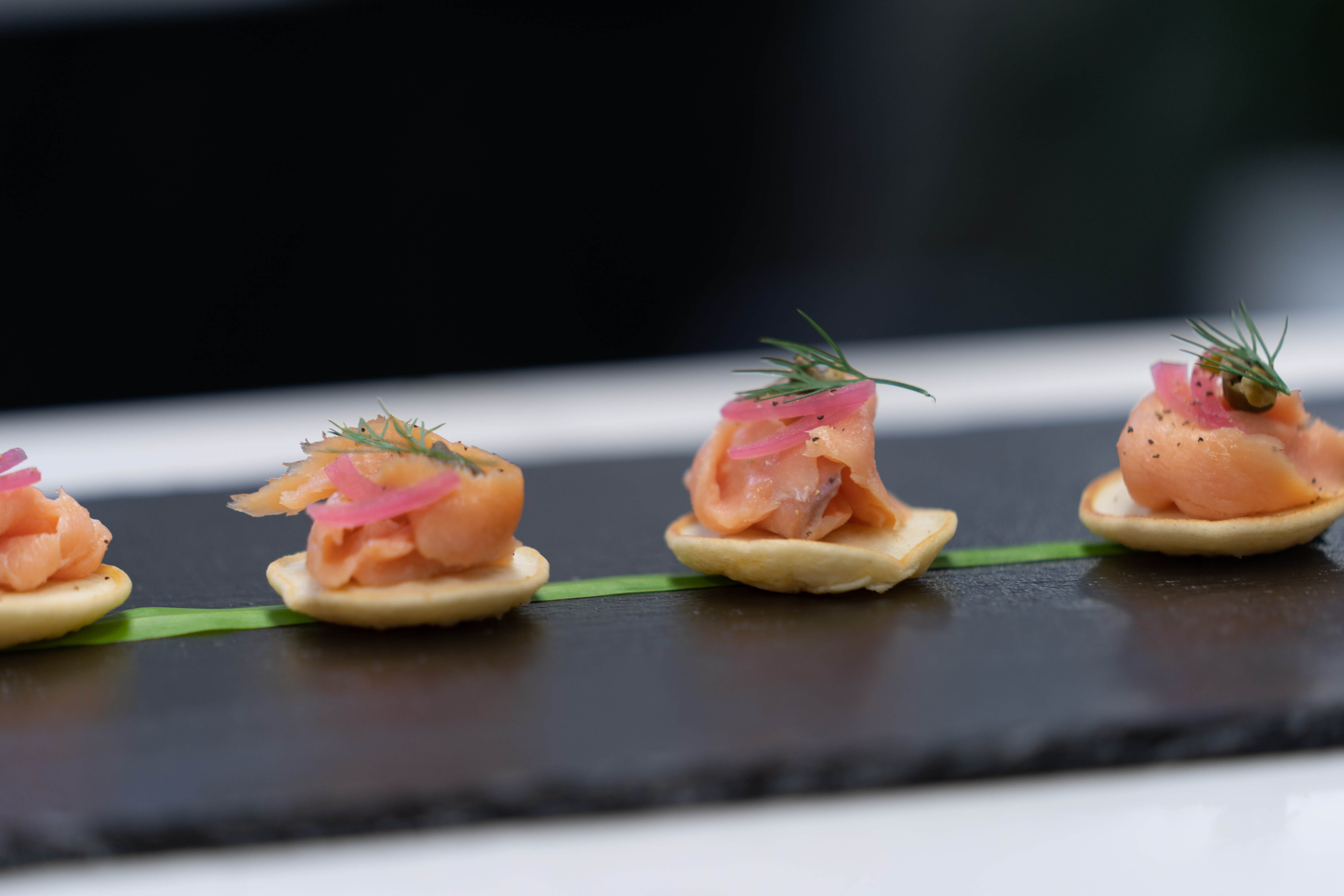 4 mise en place cayman salmon blini canapes