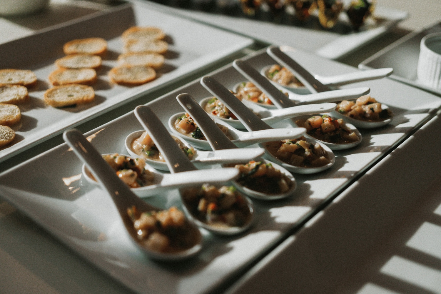 6 mise en place cayman chef decorating seared scallop passed canapes